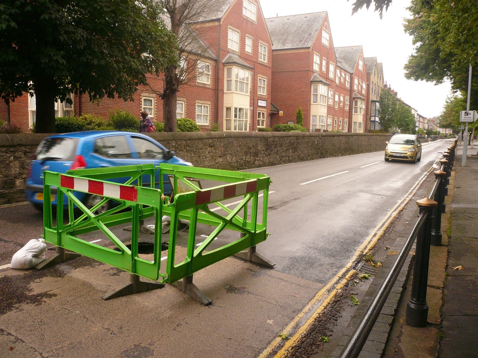 Citizen's photo of a pothole submitted with a CivicFix report