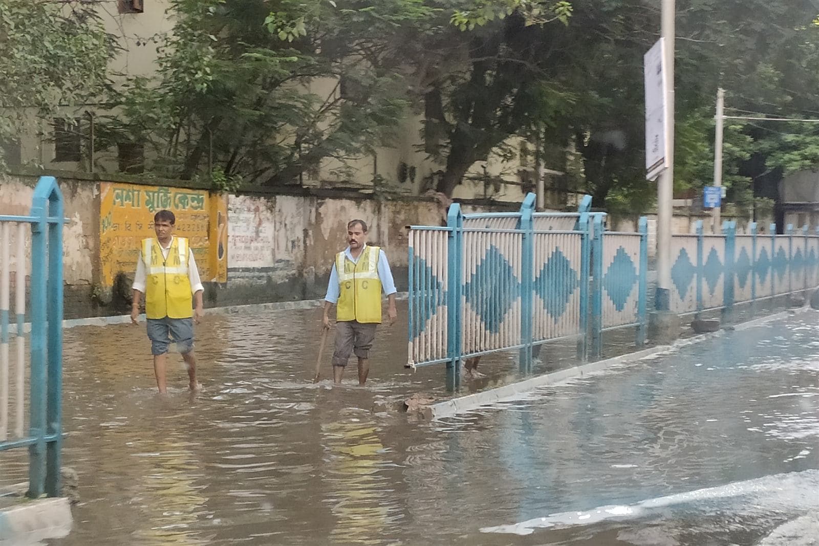 A waterlogged street in Kolkata after heavy rain — the kind of civic drainage problem citizens report on CivicFix